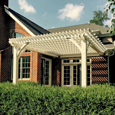 Attached Garden Pergolas (Options: 14' L x 14' W, California Redwood, No Electrical Wiring Trim, 2-Post Anchor Kit for High-Wind, Open Roof with Slats at 6", Rafters at 18", 2x4's Slats and 2x8's Rafters by Custom Request, No Post Decorative Trims, Custom Paint). Photo Courtesy of Walt and Mayra Talunas of West Chester, Pennsylvania.