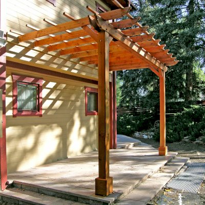 Attached Garden Pergolas (Options: 15' x 8', Attached to Wall by Support Side, Douglas-fir, No Electrical Wiring Trim, Open Roof with Slats at 18", 2-Post Anchor Kit for Stone, Transparent Premium Sealant).