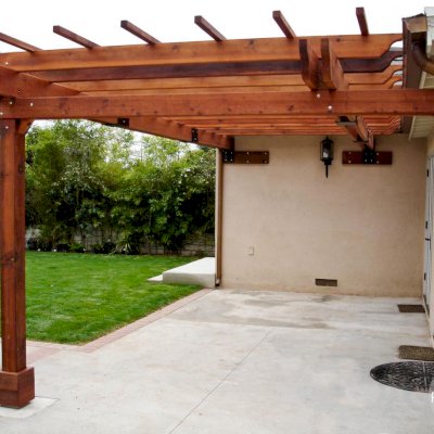 Attached Garden Pergolas (Options:10' L x 14' W, Attached to Wall by 2 Sides by Custom Request, Mature Redwood, No Electrical Wiring Trim, Open Roof with Slats at 18", 1-Post Anchor Kit for Concrete, Transparent Premium Sealant).