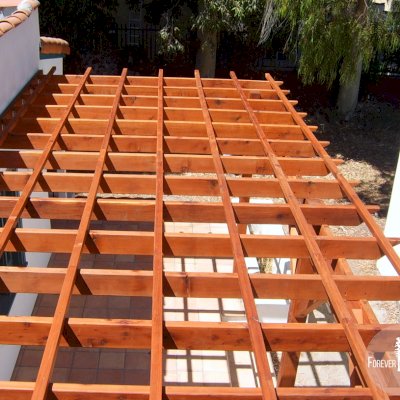 Attached Garden Pergolas (Options: 22' L x 10' W, Attached to Wall by Support Side, Mature Redwood, No Electrical Wiring Trim, Open Roof with Slats at 18", 3-Post Anchor Kit for Concrete, Transparent Premium Sealant).