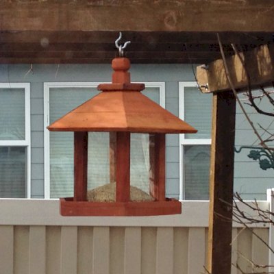 Aviary Oasis Bird Feeders (Options: Old-Growth Redwood, XW Roof Eaves, Transparent Premium Sealant).  Photo Courtesy of Marilyn Brooks of Star, Idaho.
