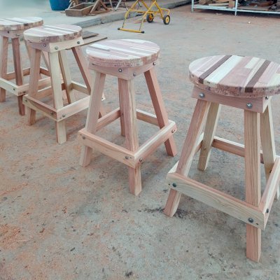 Backless Wood Bar Stools in Production (Options: 29" H, Round Seat, Mosaic Redwood, 4 Legs). 