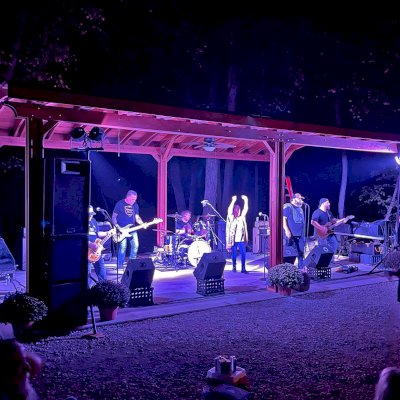 Highway 615 Band Playing Under our Backyard Pavilion (Options: 30' x 18', California Redwood, 2 Electrical Wiring Trim Kits, 6-Post Anchor Kit for High-Wind, 2 Ceiling Fan Bases, No Privacy Panels, 2 Fascia Boards, No Curtain Rods, Vertical Decorative Trims for All Posts, 10 ft Post Height, Transparent Premium Sealant). Photo Courtesy of T. Kowa of Oakley, Illinois.