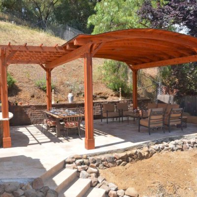 Custom Backyard Pavilion Kits (Options: 18' x 18', with 9' x 14' Garden Pergola Attached, California Redwood, 1 Electrical Wiring Trim Kit, 6-Post Anchor Kit for High-Wind, 2 Ceiling Fan Bases, No Privacy Panels, No Curtain Rods, 10 ft Post Height, Transparent Premium Sealant). Photo Courtesy of J. Angwin of Morgan Hill, CA.