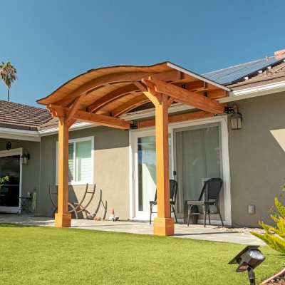 Backyard Porch Pavilion (Options: 8 'L x 10' W, Douglas-fir, 2-Post Anchor Kit for Concrete, No Electrical Wiring Trim, 8 ft Post Height, No Ceiling Fan Base, No Curtain Rods, No Privacy Panels, Transparent Premium Sealant). Photo Courtesy J. Clark of San Diego, CA.