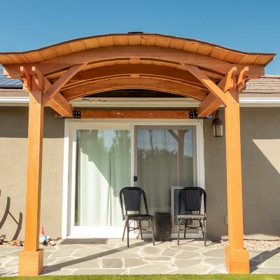 Backyard Porch Pavilion (Options: 8 'L x 10' W, Douglas-fir, 2-Post Anchor Kit for Concrete, No Electrical Wiring Trim, 8 ft Post Height, No Ceiling Fan Base, No Curtain Rods, No Privacy Panels, Transparent Premium Sealant). Photo Courtesy J. Clark of San Diego, CA.