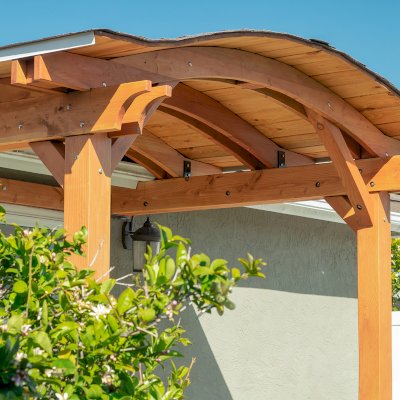 Backyard Porch Pavilion (Options: 8 'L x 10' W, Douglas-fir, 2-Post Anchor Kit for Concrete, No Electrical Wiring Trim, 8 ft Post Height, No Ceiling Fan Base, No Curtain Rods, No Privacy Panels, Transparent Premium Sealant). Photo Courtesy J. Clark of San Diego, CA.
