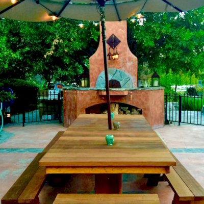 Baja Outdoor Redwood Dining Table (Options: 10 ft L, 48 inches W, Side & End Benches, 2 Half Benches Per Side, California Redwood, Standard Tabletop, Squared Corners, 2" Umbrella Hole, Transparent Premium Sealant). Photo Courtesy of Arjun Reyes of Santa Rosa Valley, CA.