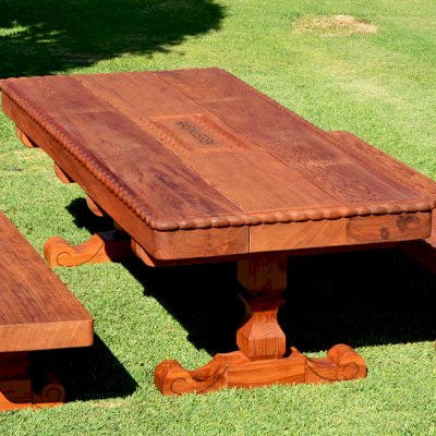 Custom Design (Options: 8' L x 3'-5" W, Old-Growth Redwood, 1/2" Corner Rounding, Custom Engraving). Made with 6 x 14 vertical grain timbers for the tabletop and a lot of custom carving!