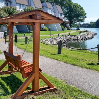 Bench Swing Sets (Options: Large Bench, With Swing Roof, Mature Redwood, Classic Style Seat, No Engraving, Transparent Premium Sealant). Photo Courtesy of Mark K. of Hampton, Virginia. 