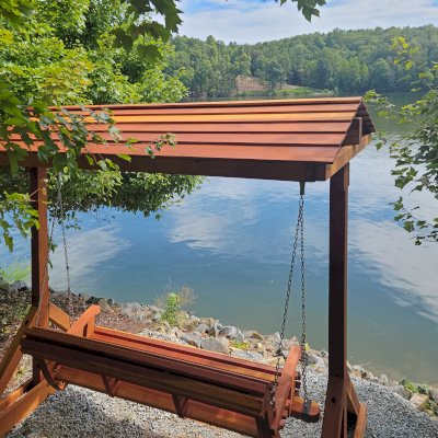 Bench Swing Sets (Options: XL Bench, Swing Roof, California Redwood, Ensenada Style Seat, No Engraving, Transparent Premium Sealant). Photo Courtesy of J. Vittori of Hardy, VA.