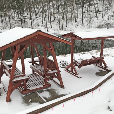 Bench Swing Sets (Options: Large Bench, Include Swing Roof, California Redwood, Ensenada Style Seat, No Engraving, Cherry Stain Premium Sealant). Photo also shows a St. Anthony's Glider. Photo Courtesy of T. Marling of Mount Horeb, WI.