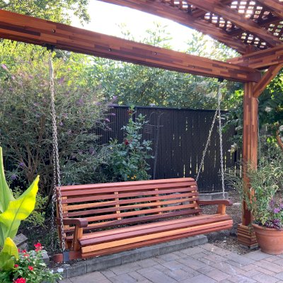 Bench Swings (Seats Only) (Options: XL Garden Bench, Mosaic Redwood, Ensenada Seat Design, No Engraving, All Beam Hanging Hardware, Transparent Premium Sealant). Swing Attached to a Arched Pergola Kit. Photo Courtesy of D. Doty of Bowie, NY.