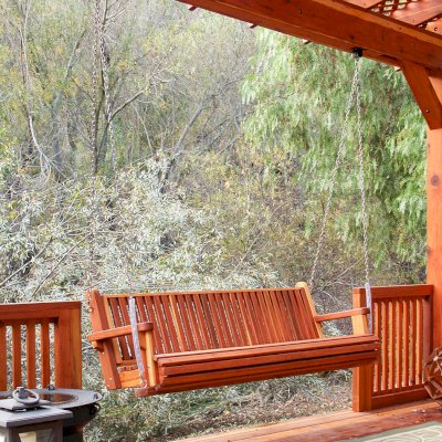 Bench Swings (Seats Only) (Options: Custom Bench Size, California Redwood, Classic Seat Design, No Engraving, All Beam Hanging Hardware, Transparent Premium Sealant). Pergola attached to a Custom Arched Pergola with Deck and Rails. Photo Courtesy of Bob P. of Westlake Village, CA.