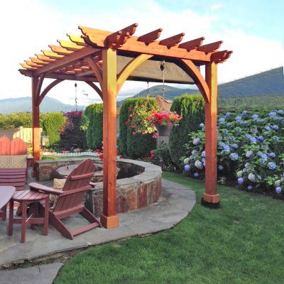 Cherry Hill Outdoor Pergola Kit (Options: 12' L x 10' W, No Privacy Panel, Mature Redwood, 9.5 ft Heigth, No Electrical Wiring Trim, 4-Post Anchor Kit for High-Wind, No Post Decorative Trim, No Ceiling Fan Base, No Curtain Rods, No Retractable Shade Canopy, Transparent Premium Sealant (recommended)). Photo Courtesy of Scott Prueter