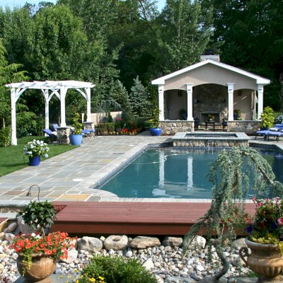 Cherry Hill Outdoor Pergola Kit(Options: 16' x 10', California Redwood, No Electrical Wiring Trim, 4-Post Anchor Kit for Stone, Brick or Concrete, No Ceiling Fan Base, No Curtain Rods, No Privacy Panels, 9' Post Height, Off-White Oil-Based). Photo Courtesy of Rich Wulwick of Cherry Hill, New Jersey.