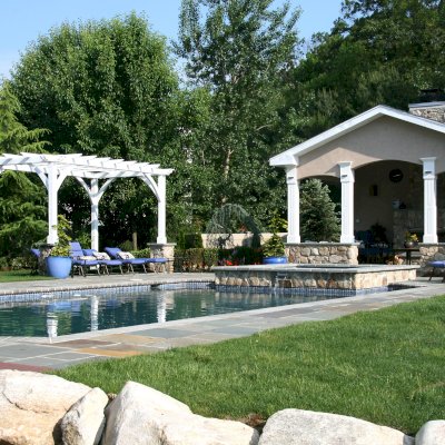 Cherry Hill Outdoor Pergola Kit(Options: 16' x 10', California Redwood, No Electrical Wiring Trim, 4-Post Anchor Kit for Stone, Brick or Concrete, No Ceiling Fan Base, No Curtain Rods, No Privacy Panels, 9' Post Height, Off-White Oil-Based). Photo Courtesy of Rich Wulwick of Cherry Hill, New Jersey.