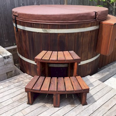 Circular Wooden Spa Step (Options: Angle to Fit Snugly for 6' Tub, California Redwood, No Engraving, Transparent Premium Sealant). Photo Courtesy of Brian L. of Provincetown, Massachusetts.