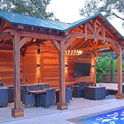 Custom Wood Pavilion Kit (Options: 30' x 15', California Redwood, Electrical Wiring Trim Kit for 2 Posts, Post Anchor Kit for High-Wind, with 2 Fan Bases, 10' H Posts, Transparent Premium Sealant, with a Back Solid Wall and Custom Dormer by Custom Request). Photo Courtesy of M. Favret of Tampa, Florida.