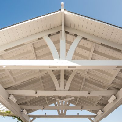 Custom Wood Pavilion Kits (Options: 28' L x 20' W, California Redwood, No Electrical Wiring Trim Kit, Posts Anchor Kit for High-Wind, Custom White Paint) with a Garden Pergola Attached. Photo Courtesy of M. Hansen of St. Helena, California.