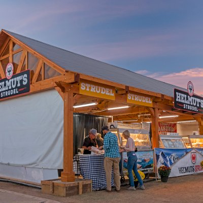 Custom Wood Pavilion Kit (Options: 43 ft L x 23 ft W, Douglas-fir, Transparent Premium Sealant). Polycarbonate enclosure added by custom request. Photo Courtesy of Tulsa, Oklahoma Oktoberfest Team.