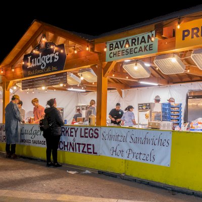 Custom Wood Pavilion Kit (Options: 43 ft L x 23 ft W, Douglas-fir, Transparent Premium Sealant). Polycarbonate enclosure added by custom request. Photo Courtesy of Tulsa, Oklahoma Oktoberfest Team.