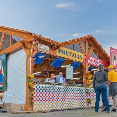 Custom Wood Pavilion Kit (Options: 43 ft L x 23 ft W, Douglas-fir, Transparent Premium Sealant). Polycarbonate enclosure added by custom request. Photo Courtesy of Tulsa, Oklahoma Oktoberfest Team.