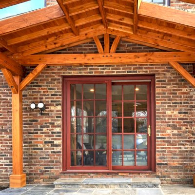 Custom Wood Pavilion Kits (Options: Douglas-fir, 1 Electrical Wiring Trim Kit, With 2 Ceiling Fan Bases, with Skylights by Custom Request, Posts Anchor Kit for High-Wind, Transparent Premium Sealant). Extra post added to fit the pavilion around the fireplace. Photo Courtesy of A. Lotwin of Potomac, Maryland.