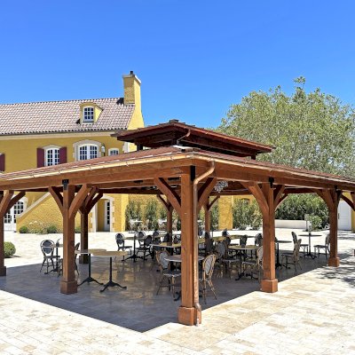 Custom Wood Pavilion (Options: 35' x 25', Douglas-fir, Post Anchor Kit for High-Wind, 8x8 Posts, 8' H Posts, No Decorative Trims for Posts, with Ceiling Fan Bases, Custom Copper Roof and Gutters, Custom Finish). Photo Courtesy of Jordan Vineyard & Winery, 1474 Alexander Valley Rd, Healdsburg, CA.
