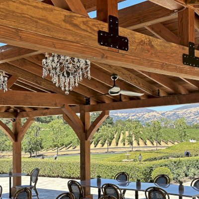 Custom Wood Pavilion (Options: 35' x 25', Douglas-fir, Post Anchor Kit for High-Wind, 8x8 Posts, 8' H Posts, No Decorative Trims for Posts, with Ceiling Fan Bases, Custom Copper Roof and Gutters, Custom Finish). Photo Courtesy of Jordan Vineyard & Winery, 1474 Alexander Valley Rd, Healdsburg, CA.