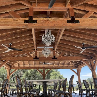Custom Wood Pavilion (Options: 35' x 25', Douglas-fir, Post Anchor Kit for High-Wind, 8x8 Posts, 8' H Posts, No Decorative Trims for Posts, with Ceiling Fan Bases, Custom Copper Roof and Gutters, Custom Finish). Photo Courtesy of Jordan Vineyard & Winery, 1474 Alexander Valley Rd, Healdsburg, CA.