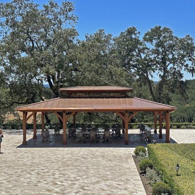 Custom Wood Pavilion (Options: 35' x 25', Douglas-fir, Post Anchor Kit for High-Wind, 8x8 Posts, 8' H Posts, No Decorative Trims for Posts, with Ceiling Fan Bases, Custom Copper Roof and Gutters, Custom Finish). Photo Courtesy of Jordan Vineyard & Winery, 1474 Alexander Valley Rd, Healdsburg, CA.