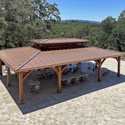 Custom Wood Pavilion (Options: 35' x 25', Douglas-fir, Post Anchor Kit for High-Wind, 8x8 Posts, 8' H Posts, No Decorative Trims for Posts, with Ceiling Fan Bases, Custom Copper Roof and Gutters, Custom Finish). Photo Courtesy of Jordan Vineyard & Winery, 1474 Alexander Valley Rd, Healdsburg, CA.
