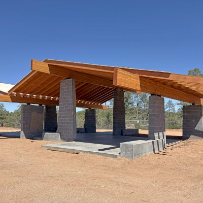 Custom Wood Pavilion Kits (Options: 63.5' x 45', Douglas-fir, 7 1/4'' x 22 1/2'' Built-Up Beams [Supports], 2 x 10 Beams, 3:12 Slope, Transparent Premium Sealant). Photo Courtesy of K. Evans of Payson, Arizona.