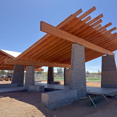 Custom Wood Pavilion Kits (Options: 63.5' x 45', Douglas-fir, 7 1/4'' x 22 1/2'' Built-Up Beams [Supports], 2 x 10 Beams, 3:12 Slope, Transparent Premium Sealant). Photo Courtesy of K. Evans of Payson, Arizona.