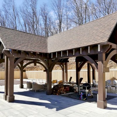 Custom Wood Pavilion Kits (Options: 30' L x 18' W Pavilion with 13' x 13' Dormer, Douglas-fir, No Electrical Wiring Trim Kit, Post Anchor Kit for High-Wind, Coffee-Stain Premium Sealant). Photo Courtesy of M. Tzezailidis of Warwick, New York.
