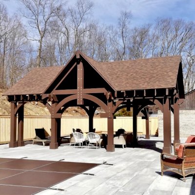 Custom Wood Pavilion Kits (Options: 30' L x 18' W Pavilion with 13' x 13' Dormer, Douglas-fir, No Electrical Wiring Trim Kit, Post Anchor Kit for High-Wind, Coffee-Stain Premium Sealant). Photo Courtesy of M. Tzezailidis of Warwick, New York.