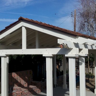 Custom Wood Pavilion Kits (Options: 20' L, 16'-5 1/2" W, Douglas, 4-Post Anchor Kit for Concrete, Electrical Wiring Trim 1 post, 9 ft H, Add a Ceiling Fan Base, No Privacy Panels, No Curtain Rods, Moulding Finish Style, Custom White Paint). Customer Request: 7 1/4" Long & Short Supports, 7 1/4" Rafters. 3/4" Roof Boards