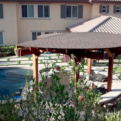 Custom Wood Pavilion Kits (Options: 24' Diameter. Post 9'-3/4", Arch Supports, 6 Grades Slope Roof, California  Redwood, Unattached, Electrical Wiring Trim for 1 Post, 6-Post Anchor Kit for Concrete, No Ceiling Fan Base, No Privacy Panels, No Curtain Rods, 10' Post Height, Transparent Premium Sealant)