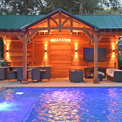 Custom Wood Pavilion Kit (Options: 30' x 15', California Redwood, Electrical Wiring Trim Kit for 2 Posts, Post Anchor Kit for High-Wind, with 2 Fan Bases, 10' H Posts, Transparent Premium Sealant, with a Back Solid Wall and Custom Dormer by Custom Request). Photo Courtesy of M. Favret of Tampa, Florida.
