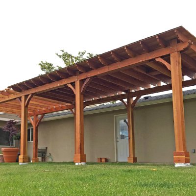 Custom Wood Pavilion Kits (Options: 24' L x 12' W, California Redwood, One Ceiling Fan Base, Electrical Wiring Trim Kit for 1 Post, 8-Post Anchor Kif for High-Wind, 8 x 8 Posts by Custom Request, Transparent Premium Sealant) with a 14' L x 12' W Garden Pergola Attached. Photo Courtesy of G. Scotzin of Pasco, WA.