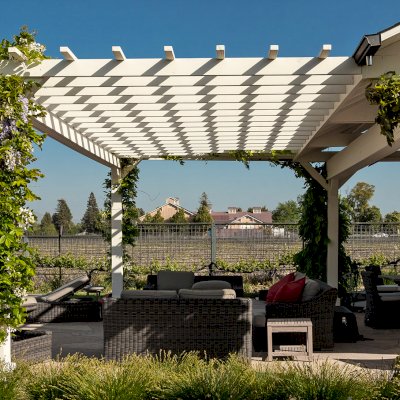 Custom Wooden Pergola with Attached Pavilion (Options: 26' L x 12' W, California Redwood, No Electrical Wiring Trim Kit, Post Anchor Kit for High-Wind, Custom White Paint) with a Garden Pergola Attached. Photo Courtesy of M. Hansen of St. Helena, California.