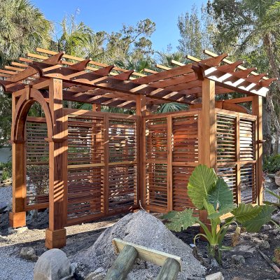Custom Garden Pergola (Options: L-Shaped, Mature Redwood, with Louvered Walls, Transparent Premium Sealant). Photo Courtesy of S. Hase of Longboat Key, FL.