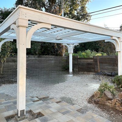 Custom Wooden Pergola (Options: 15' x 20', Douglas-fir, 9.5' H Posts, 8x8 Posts, Electrical Wiring Trim Kit for All Posts, 1 Ceiling Fan Base, Horizontal Decorative Trims for All Posts, Posts Anchor Kit for High-Wind, Off-White Oil-Based Primer). Photo Courtesy of K. Kramer of East Palo Alto, CA.