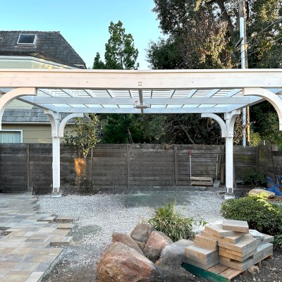 Custom Wooden Pergola (Options: 15' x 20', Douglas-fir, 9.5' H Posts, 8x8 Posts, Electrical Wiring Trim Kit for All Posts, 1 Ceiling Fan Base, Horizontal Decorative Trims for All Posts, Posts Anchor Kit for High-Wind, Off-White Oil-Based Primer). Photo Courtesy of K. Kramer of East Palo Alto, CA.