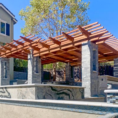 Custom Wooden Fat Timber Pergola (Options: 24' x 33', Mature Redwood, No Posts - Pergola Roof Installed Atop Existing Load Bearing Columns, with Louvered Panels, Transparent Premium Sealant). Photo Courtesy of C. Young of Los Gatos, CA.