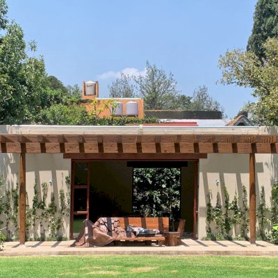 Custom Attached Garden Pergola (Options: 11' x 28', California Redwood, Rounded Columns, 8x12 Supports, 6x8 Rafters, 3x3 Slats, Custom Finish). Photo Courtesy of R. Serrano of Mexico City.
