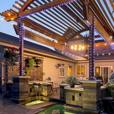 Custom Wooden Pergola (Options: 30' L x 18' W, California Redwood, No Electrical Wiring Trim, Trims to Cover 3 Metal Posts Installed by Customer, Coffee-Stain Premium Sealant). Photo Courtesy of K. Lufkin of Petoskey, Michigan.