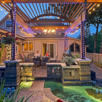 Custom Wooden Pergola (Options: 30' L x 18' W, California Redwood, No Electrical Wiring Trim, Trims to Cover 3 Metal Posts Installed by Customer, Coffee-Stain Premium Sealant). Photo Courtesy of K. Lufkin of Petoskey, Michigan.