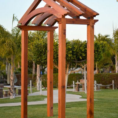 Custom Entryway Arbor/Pergola (Options: 11'-7" x 5'-9", with 8x8 Supports and 6x8 Rafters, Mature Redwood, Transparent Premium Sealant). Yes, we can make an entryway arbor in any size and style you like... Photo Courtesy of M. Day of Mill Valley, CA.